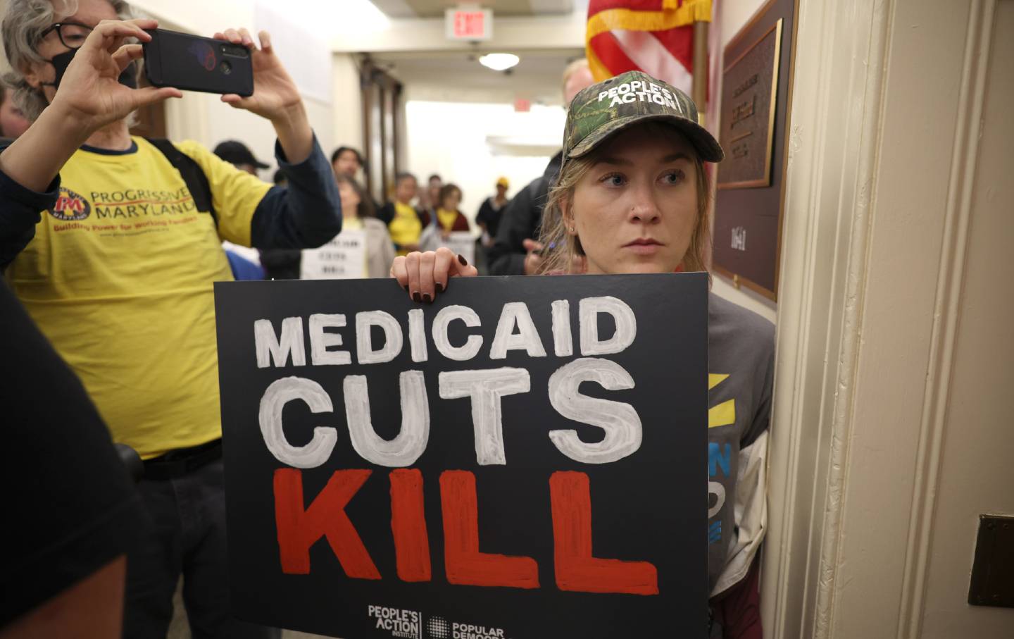 Activists outside the office of US Representative Jeff Hurd (R-CO) in response to proposed cuts to Medicaid, on May 21, 2025, in Washington, DC.